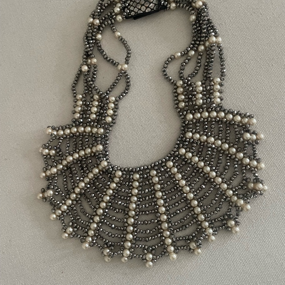 Silver and White Bib Necklace with Intricate Beadwork